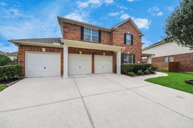 13710 Breezy Meadow Ct, Houston, TX 77044 - traditional-style home with driveway, brick siding, and an attached garage