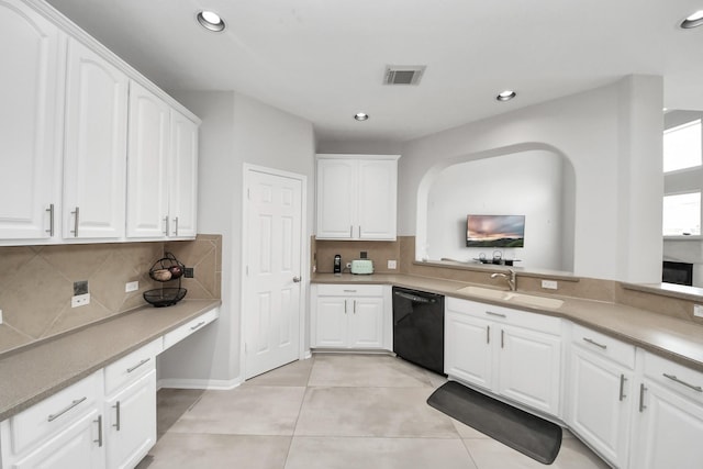 13710 Breezy Meadow Ct, Houston, TX 77044 - kitchen featuring dishwasher, white cabinetry, tasteful backsplash, light tile patterned floors, and recessed lighting