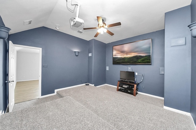 13710 Breezy Meadow Ct, Houston, TX 77044 - carpeted home theater room featuring a ceiling fan and lofted ceiling