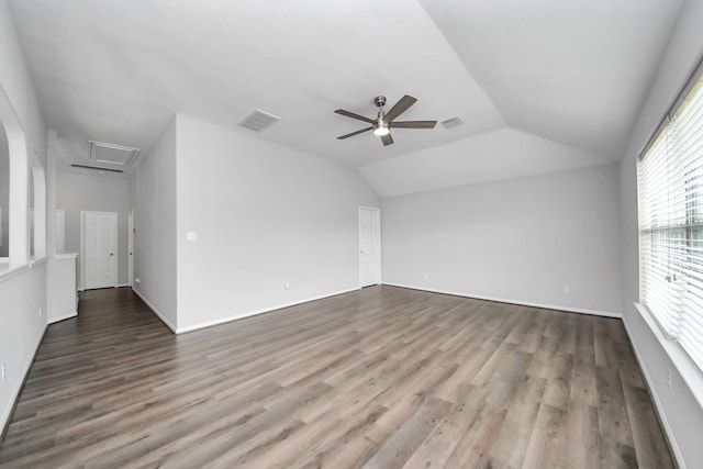 13710 Breezy Meadow Ct, Houston, TX 77044 - unfurnished living room with ceiling fan, vaulted ceiling, wood finished floors, and attic access