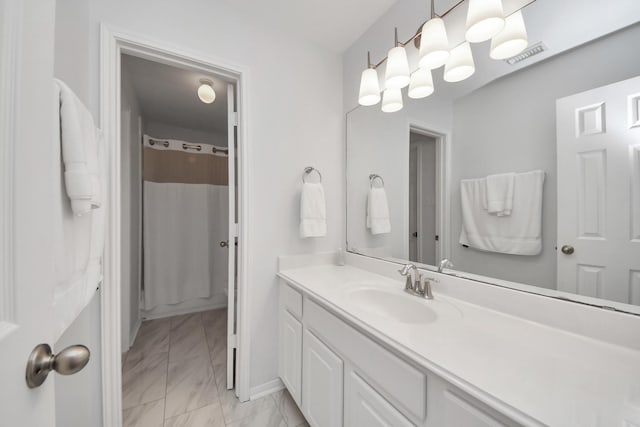 13710 Breezy Meadow Ct, Houston, TX 77044 - full bathroom with vanity, marble finish flooring, and a shower with curtain