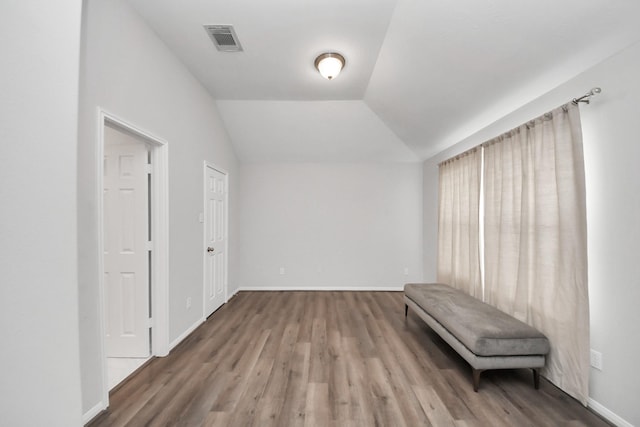 13710 Breezy Meadow Ct, Houston, TX 77044 - unfurnished room featuring wood finished floors and lofted ceiling