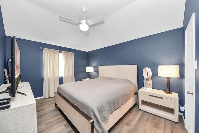 13710 Breezy Meadow Ct, Houston, TX 77044 - bedroom with wood finished floors and a ceiling fan