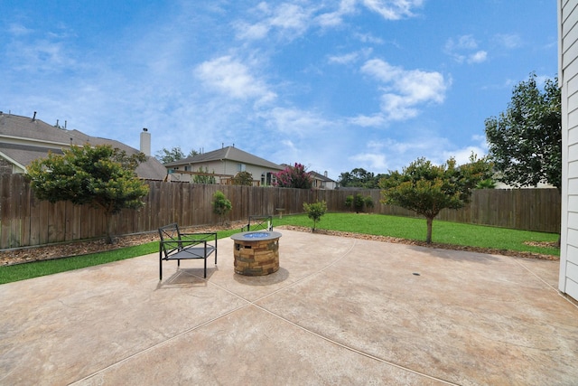 13710 Breezy Meadow Ct, Houston, TX 77044 - fenced backyard with a fire pit and a patio area
