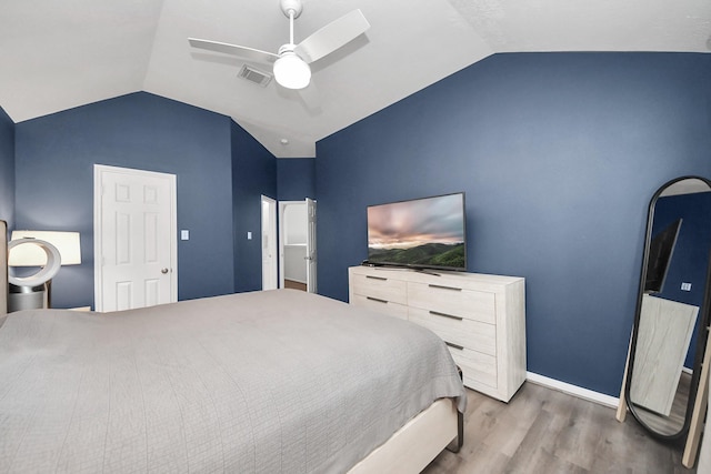 13710 Breezy Meadow Ct, Houston, TX 77044 - bedroom with vaulted ceiling, wood finished floors, and ceiling fan