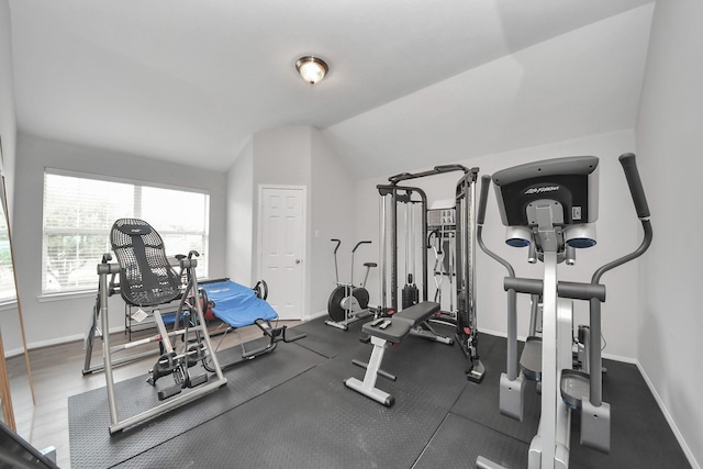 13710 Breezy Meadow Ct, Houston, TX 77044 - workout room with vaulted ceiling and baseboards