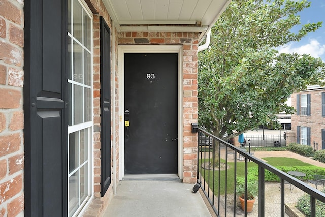 6410 Del Monte Dr Unit 93, Houston, TX 77057 - view of exterior entry featuring brick siding