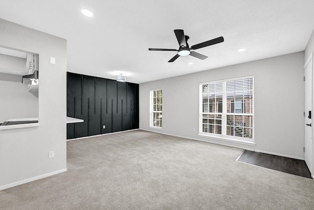 6410 Del Monte Dr Unit 93, Houston, TX 77057 - unfurnished living room with a ceiling fan, carpet flooring, and recessed lighting