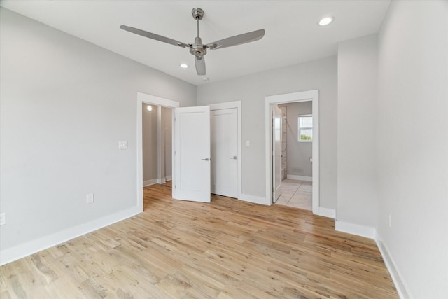 919 W 16th St Unit C, Houston, TX 77008 - unfurnished bedroom featuring light wood-style flooring, ensuite bathroom, recessed lighting, a ceiling fan, and a closet