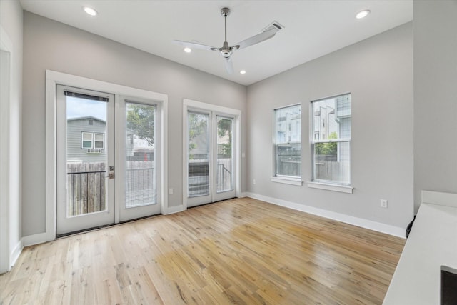 919 W 16th St Unit C, Houston, TX 77008 - spare room featuring ceiling fan, light wood-style flooring, recessed lighting, and french doors