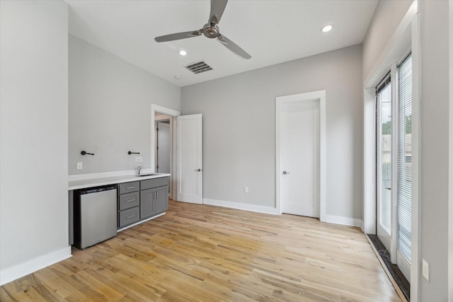 919 W 16th St Unit C, Houston, TX 77008 - unfurnished bedroom with light wood-type flooring, recessed lighting, and a ceiling fan