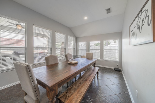 18403 Sierra Falls Ct, Tomball, TX 77377 - dining area with vaulted ceiling, dark tile patterned floors, and recessed lighting