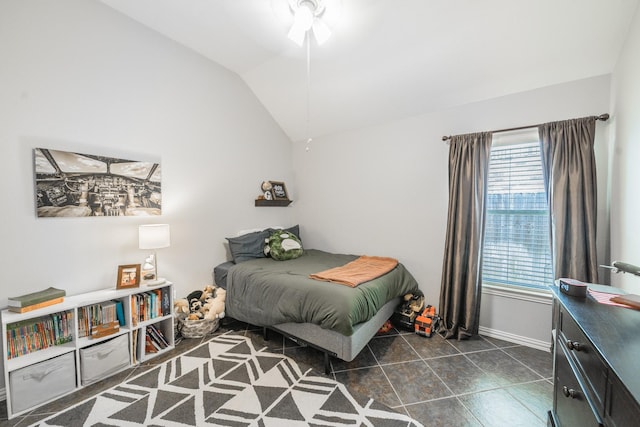 18403 Sierra Falls Ct, Tomball, TX 77377 - bedroom with vaulted ceiling and dark tile patterned floors