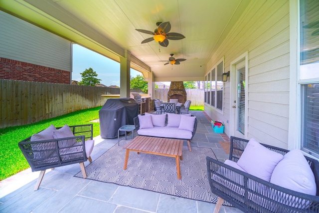 18403 Sierra Falls Ct, Tomball, TX 77377 - fenced backyard with outdoor lounge area, a patio area, area for grilling, and ceiling fan
