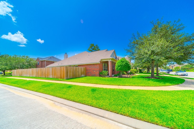 18403 Sierra Falls Ct, Tomball, TX 77377 - view of home's exterior featuring brick siding