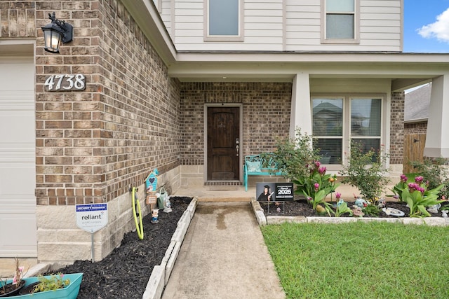 4738 Alluvial Cir, Alvin, TX 77511 - view of exterior entry featuring brick siding