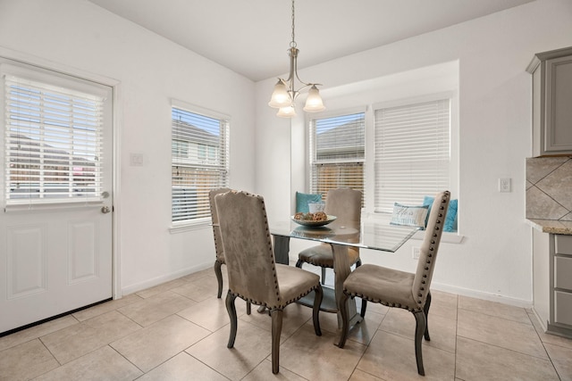 4738 Alluvial Cir, Alvin, TX 77511 - dining room with a chandelier and light tile patterned floors