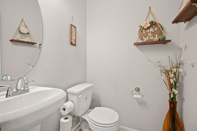 4738 Alluvial Cir, Alvin, TX 77511 - bathroom featuring toilet and a sink