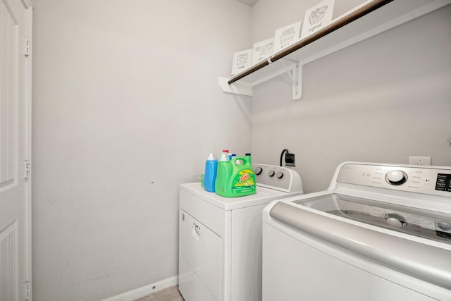 4738 Alluvial Cir, Alvin, TX 77511 - laundry room with washer and clothes dryer and baseboards