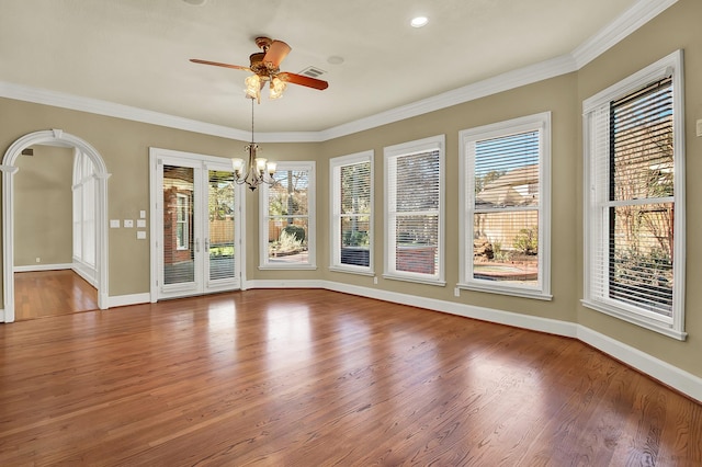 13714 Gainesway Dr, Cypress, TX 77429 - unfurnished dining area featuring a chandelier, wood finished floors, a ceiling fan, and ornamental molding