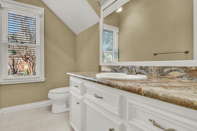 13714 Gainesway Dr, Cypress, TX 77429 - bathroom with vanity, tile patterned floors, and lofted ceiling