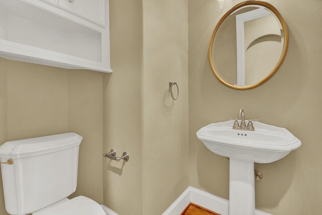 13714 Gainesway Dr, Cypress, TX 77429 - half bathroom featuring toilet and baseboards