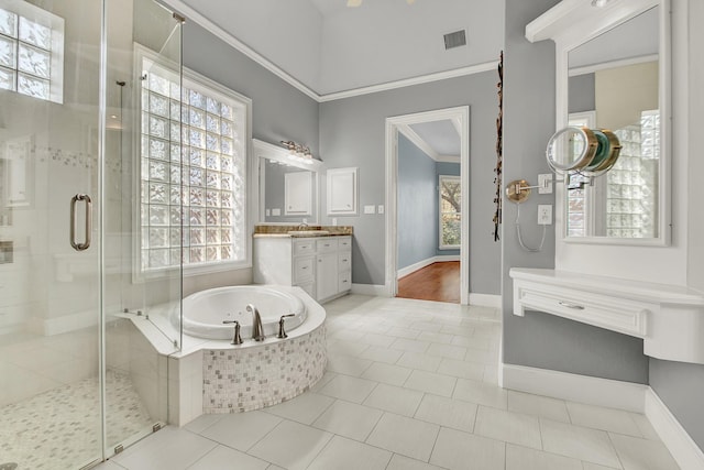 13714 Gainesway Dr, Cypress, TX 77429 - full bath with a shower stall, a bath, vanity, tile patterned floors, and ornamental molding