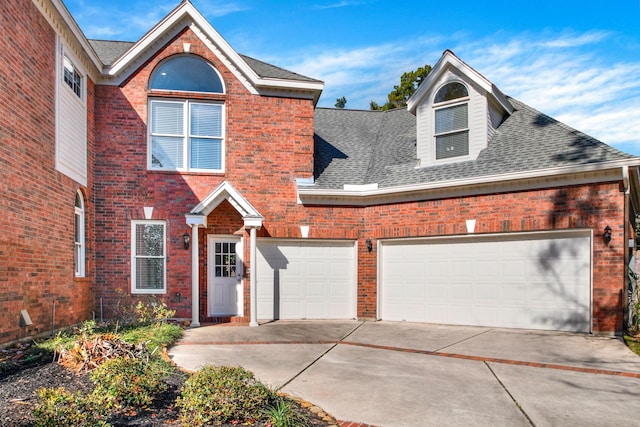 13714 Gainesway Dr, Cypress, TX 77429 - traditional-style home featuring brick siding, concrete driveway, and a shingled roof