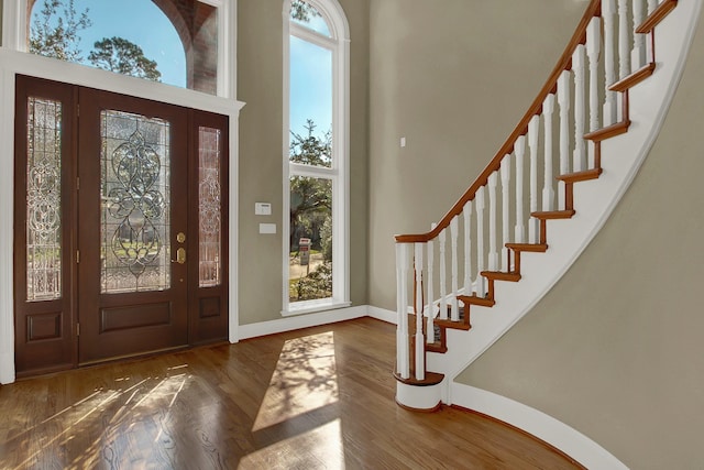 13714 Gainesway Dr, Cypress, TX 77429 - foyer with wood finished floors, stairs, and a high ceiling
