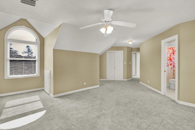 13714 Gainesway Dr, Cypress, TX 77429 - additional living space with carpet floors, lofted ceiling, and a ceiling fan