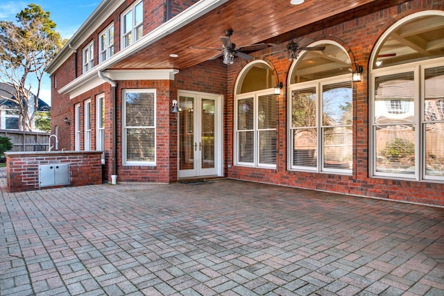 13714 Gainesway Dr, Cypress, TX 77429 - view of patio / terrace with french doors and a ceiling fan
