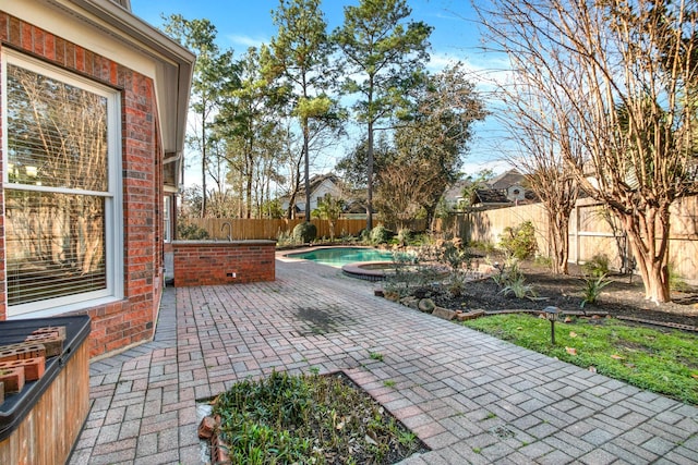 13714 Gainesway Dr, Cypress, TX 77429 - fenced backyard featuring a patio and an in-ground hot tub