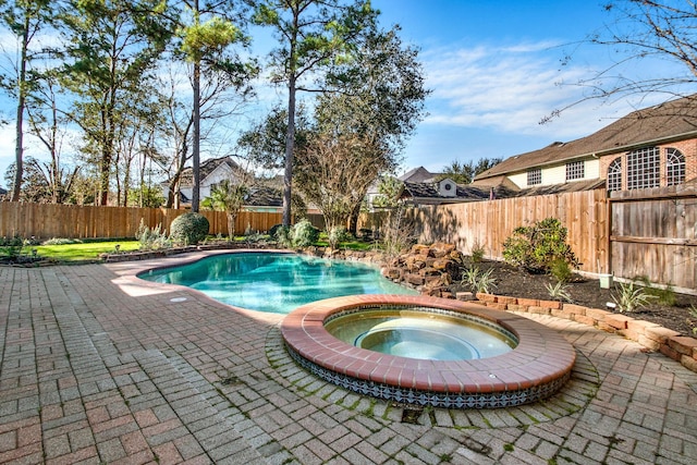13714 Gainesway Dr, Cypress, TX 77429 - view of swimming pool featuring an in-ground hot tub, a fenced backyard, and a patio area