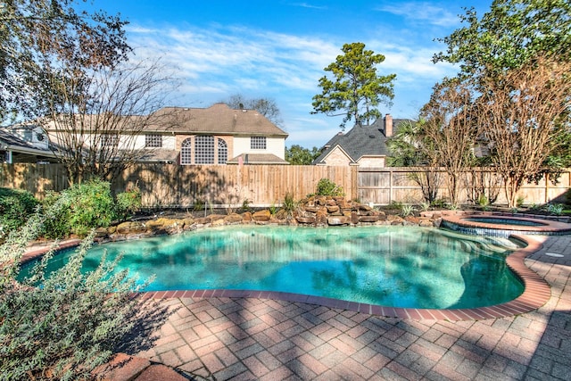 13714 Gainesway Dr, Cypress, TX 77429 - view of swimming pool with a fenced backyard, a patio area, and a pool with connected hot tub