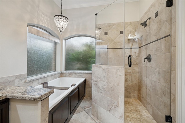 13307 Oddom Ct, Cypress, TX 77429 - full bathroom with a stall shower, a bath, crown molding, and a chandelier