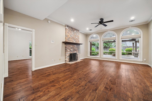13307 Oddom Ct, Cypress, TX 77429 - unfurnished living room featuring ceiling fan, wood finished floors, crown molding, a fireplace, and recessed lighting
