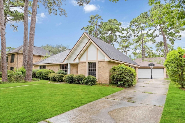 3618 Coltwood Dr, Spring, TX 77388 - tudor home with a front yard, concrete driveway, brick siding, and roof with shingles