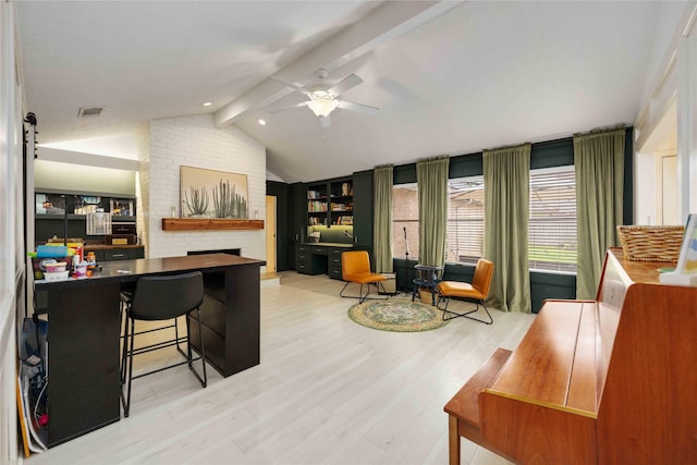 3618 Coltwood Dr, Spring, TX 77388 - home office featuring wood finished floors, a ceiling fan, and a fireplace
