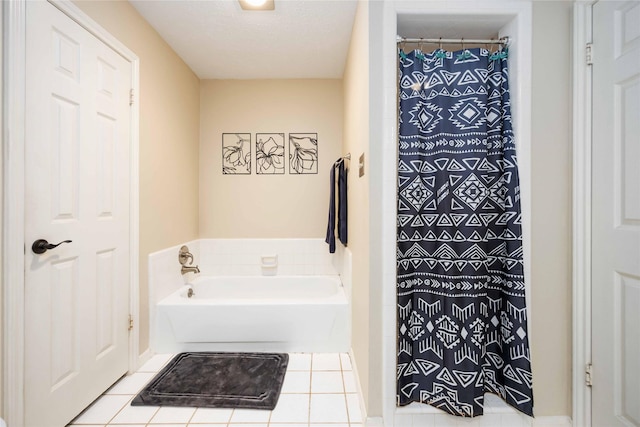 3618 Coltwood Dr, Spring, TX 77388 - bathroom with tile patterned flooring, a garden tub, and a shower with curtain