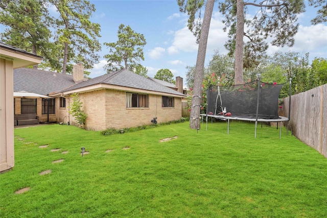 3618 Coltwood Dr, Spring, TX 77388 - fenced backyard featuring a trampoline