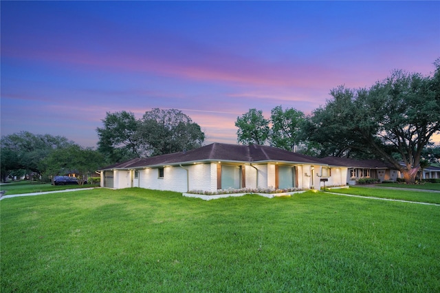 10011 Cliffwood Dr, Houston, TX 77035 - single story home featuring a front yard, an attached garage, and brick siding