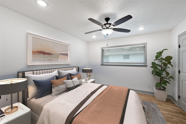10011 Cliffwood Dr, Houston, TX 77035 - bedroom featuring wood finished floors, recessed lighting, and ceiling fan