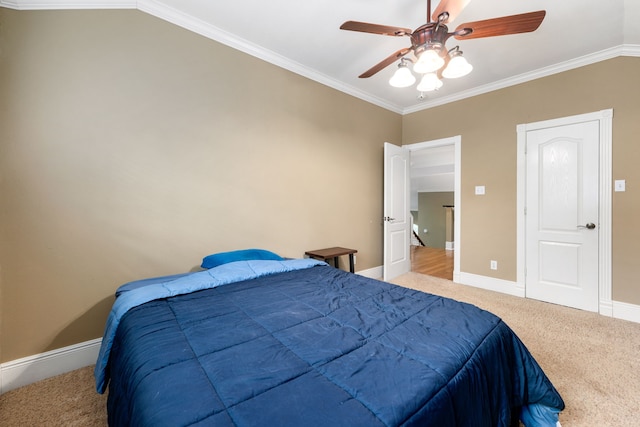600 Crystal River Rd, Conroe, TX 77316 - bedroom featuring carpet flooring, ornamental molding, and a ceiling fan