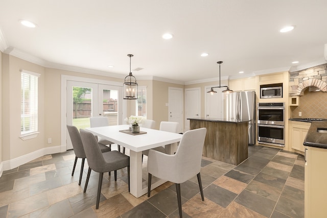 600 Crystal River Rd, Conroe, TX 77316 - dining room featuring recessed lighting, stone tile floors, crown molding, and french doors
