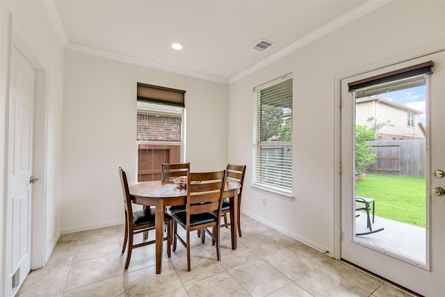 12106 Coldwater Cove Ln, Cypress, TX 77433 - dining area with crown molding, light tile patterned floors, and recessed lighting
