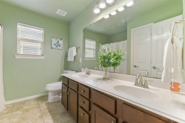 12106 Coldwater Cove Ln, Cypress, TX 77433 - full bathroom featuring double vanity, tile patterned flooring, and curtained shower