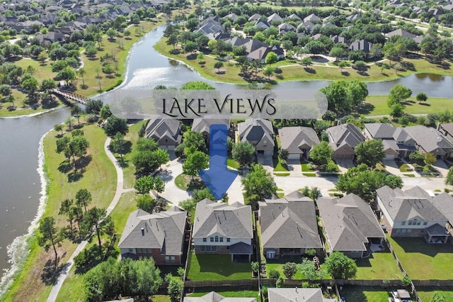 12106 Coldwater Cove Ln, Cypress, TX 77433 - aerial perspective of suburban area with a large body of water