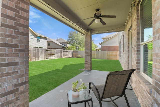 12106 Coldwater Cove Ln, Cypress, TX 77433 - fenced backyard with a patio and a ceiling fan