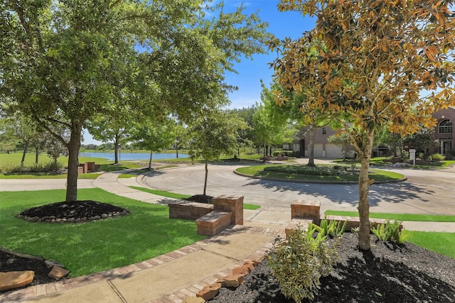 12106 Coldwater Cove Ln, Cypress, TX 77433 - view of property's community with a water view and a lawn