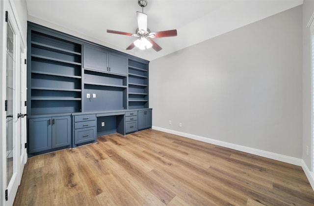 28006 Brendon Trail Ct, Spring, TX 77386 - unfurnished office featuring ceiling fan, built in study area, and light wood finished floors